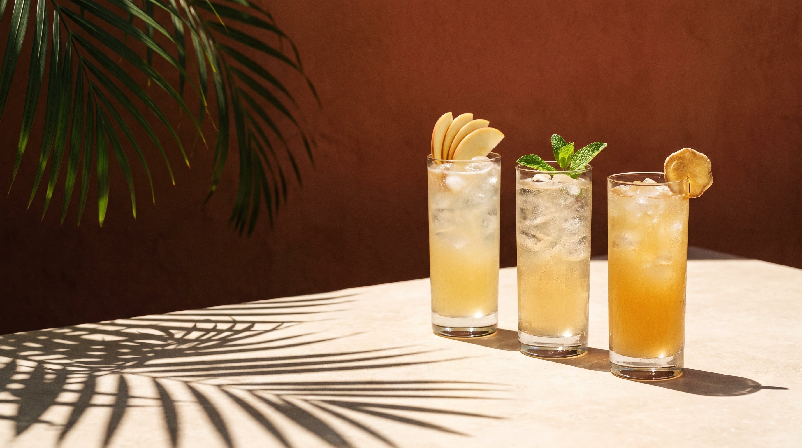 Three Gem Juice serves in hard sunlight: Original, Mint and Apple ginger drinks over ice