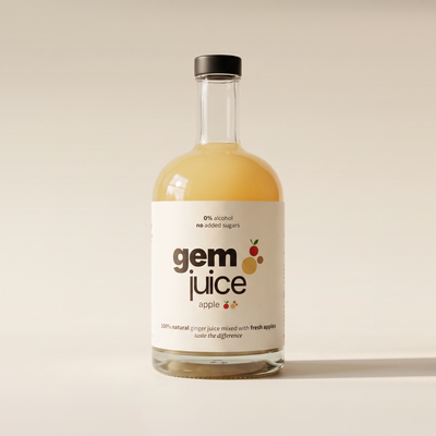 Gem Juice Apple bottle featuring a natural ginger and apple drink, 0% alcohol, no added sugars.